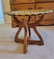 Folding brass accent table.