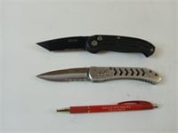 Two spring assist knives one is a Boker