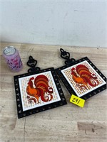 Two cast iron rooster trivets