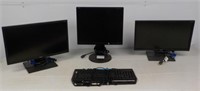 (3) Computer monitors and a keyboard.