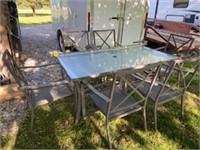 Glass top patio table & 6 chairs, 66x40