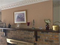 Items on fireplace and mantle