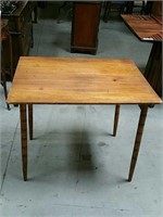 Game table with folding legs