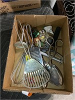 lot of kitchen items whisk, etc.