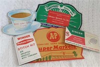 Vintage needle holders with advertising