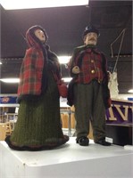 Man and woman Carolers