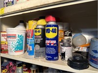 Shelf of WD-40, Expanding Foam, Lubricants and
