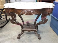 Victorian marble top parlor table w/ dog carving