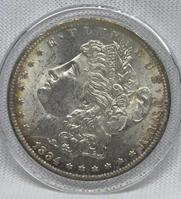 OF)  1884-o Morgan dollar condition MS
