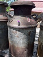 Antique 5 gallon metal milk urn with lid.