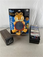 Vintage Garfield shower radio, cassettes, and