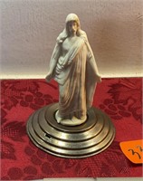 Vintage bisque Jesus on silver plate stand