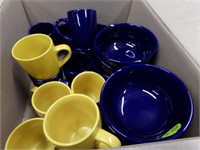 Blue and yellow cups and bowls