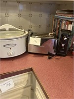 large crock pot, toaster and can opener