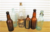 Antique advertising bottles