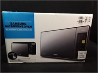 New Samsung 1.4 cu ft Microwave Oven. Model