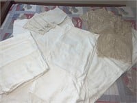 Assorted vintage tablecloths and linens