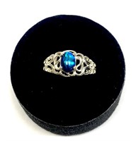 Sterling silver oval cabochon blue paua ring,