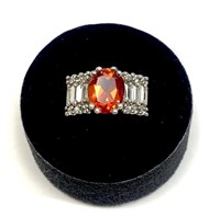 Sterling silver oval cut orange lab sapphire ring