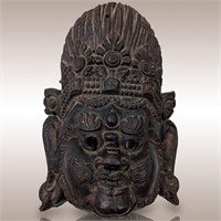An Antique Carved Wooden Mask, More Information To