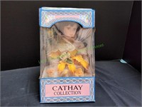 Cathay Collection Flower Porcelain Doll w/ Swing