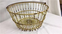 Yellow metal basket 8”h rusty
