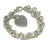 Tiffany & Co. Sterling Bracelet with Heart Tag.