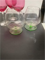Cranberry glass and uranium glass cups