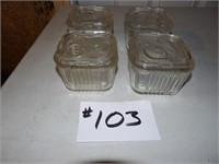 4) clear glass 1 pint covered refrigerator dishes