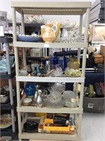 Rack of miscellaneous home goods (Rack not