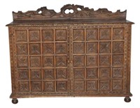 A Spanish Colonial Revival Walnut Sideboard