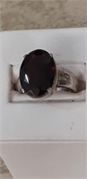 Ster.  Silver ring - large deep red stone size 8.5