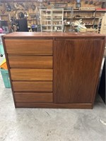 Wooden dresser with 5 tiered shelf and door with