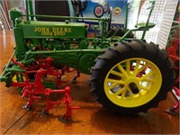 John Deere model A die cast toy tractor