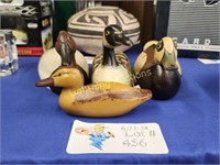 FOUR CARVED WOOD DUCKS