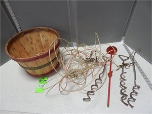Pet leads and stakes in an apple basket
