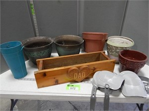 Planters (some are plastic); planter box; knee pad