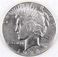 Coin 1928-P Peace Silver Dollar in Almost Unc.