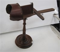 Stereoptic viewer on stand is 12" tall.