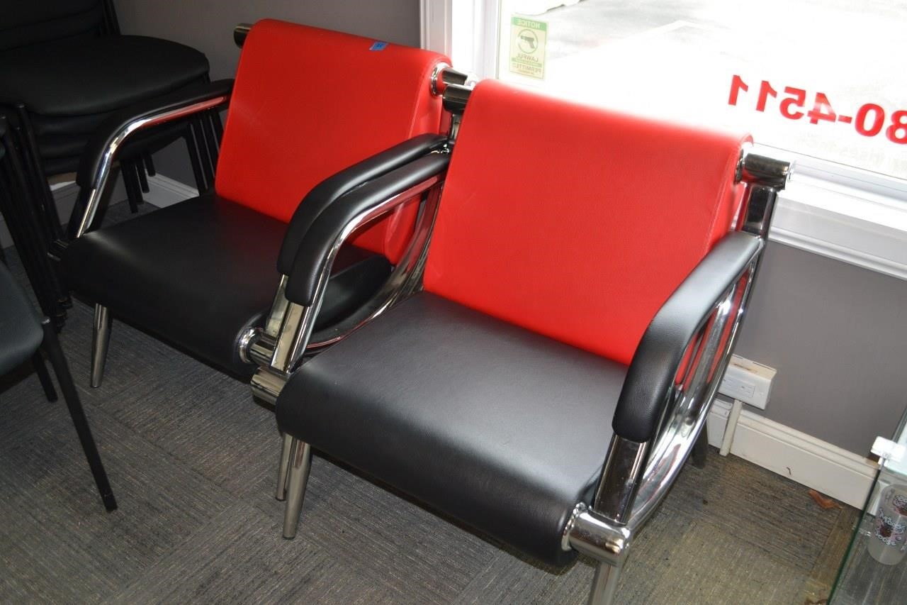 11: (2) red/black lounge/waiting room chairs