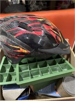 Lot with bike helmet, silicone ice trays, and