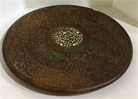 Very large carved wooden round tray with an