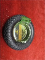 Green glass Goodyear tire ashtray.