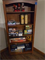 Games and puzzles on shelf, shelf not included