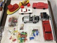Lot of toy cars and plastic figures
