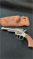 Pony boy cap gun in a leather holster