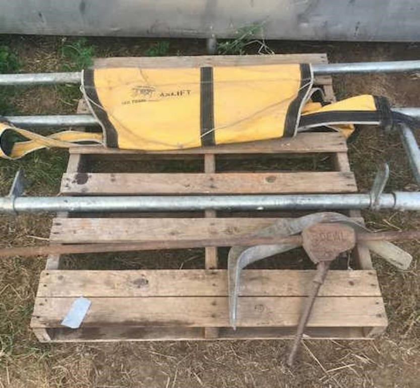 Cow sling & calf-puller on pallet