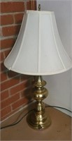 Gold colored shade lamp