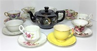 Tea Cups & Saucers and One Tea Pot