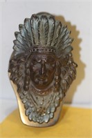 A Bronze Indian Clip